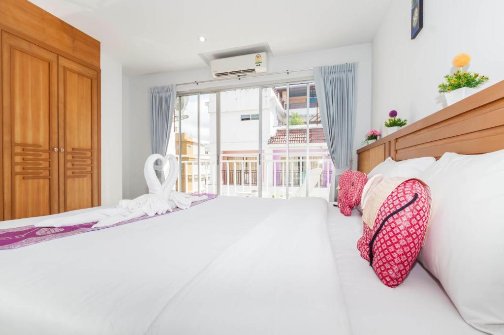 Larn Park Resortel Patong Zimmer foto