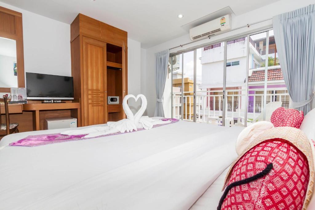 Larn Park Resortel Patong Zimmer foto