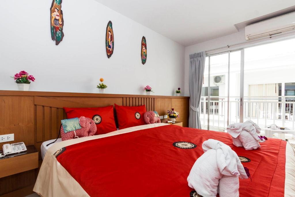 Larn Park Resortel Patong Zimmer foto