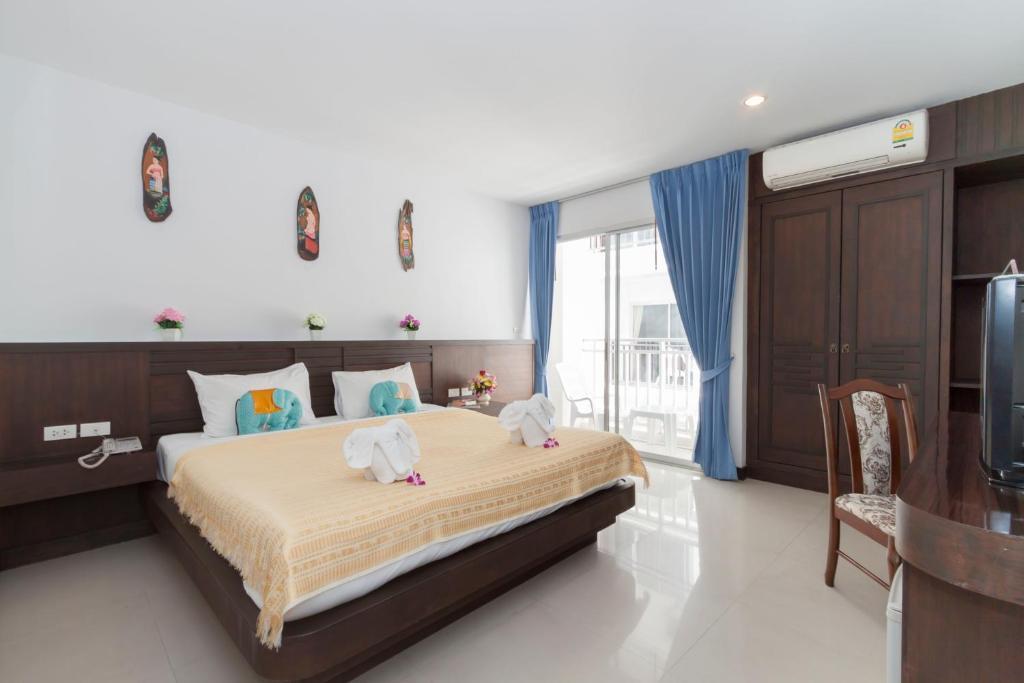Larn Park Resortel Patong Zimmer foto