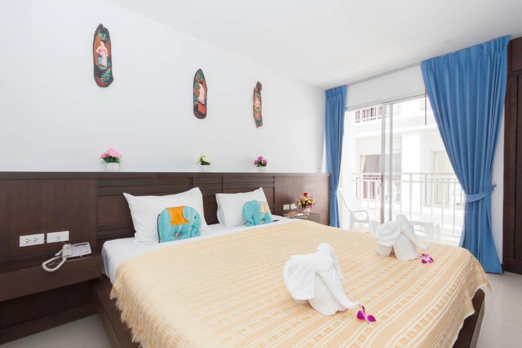 Larn Park Resortel Patong Zimmer foto