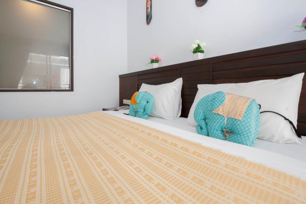 Larn Park Resortel Patong Zimmer foto